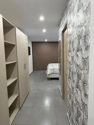 a room with a bedroom with a bed in it at Paradise Apartment at Gallerias Escalon in Colonia Escalón
