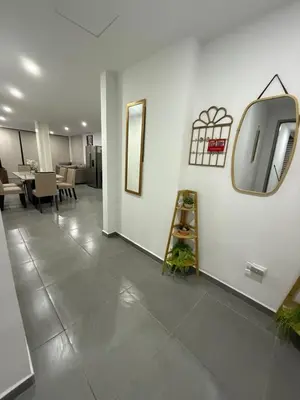 a room with a hallway with a mirror and a shelf at Paradise Apartment at Gallerias Escalon in Colonia Escalón