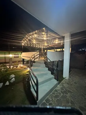 a group of stairs with lights on them at night at Moderno & acogedor Apartmento, 2 habitaciones , 4 camas in Concepción de Ataco