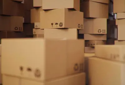 a stack of boxes in a room at Grama in Cinquera