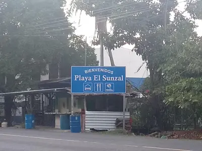 a sign that says play eb survival in front of a building at Sunzal Refugio Perfecto-3 in El Sunzal