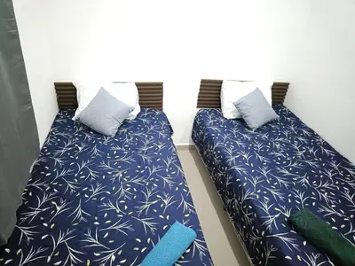 two beds sitting next to each other in a room at Casa de Reyes in San Miguel