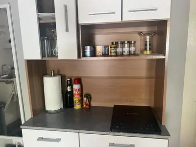 a kitchen with a counter with a laptop on it at Smart and Modern Room Full Amenities in San Salvador in San Salvador