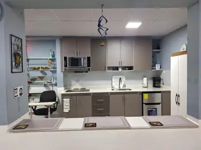 a small kitchen with a counter and a sink at Pearl of the sea in La Libertad