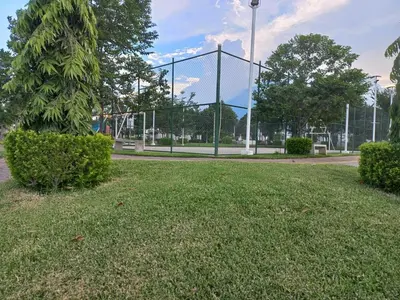 a park with a fence and a grass field at Casa Romero in San Miguel
