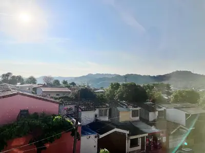 an overhead view of a city with houses and trees at Ipan Noya in Nueva San Salvador