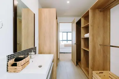 a bathroom with a sink and a mirror at Cielo 404 in San Salvador