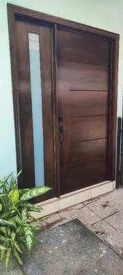 a wooden door of a house at La casa de Bába in San Salvador