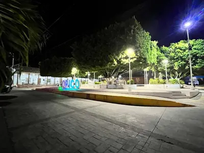 a park at night with street lights at Home Sweet Home at Opico Garden in San Juan Opico
