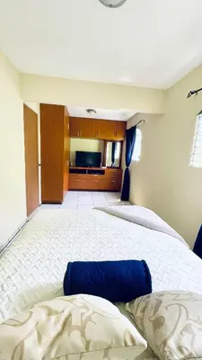 a bedroom with a large bed in a room at Modern Stylish Apt in Secure Area in San Salvador in San Salvador
