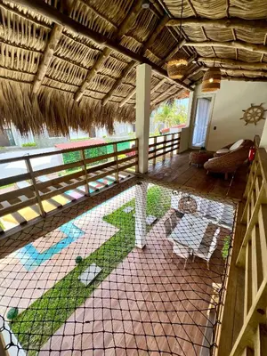 an aerial view of a house with a balcony at Villa Nakär - Oceanfront Luxury Villa in Playa Amatecampo, El Salvador in La Esmeralda