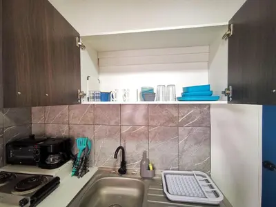 a kitchen with a sink and a counter top at Apartamento privado, Miramonte, San Salvador in San Salvador
