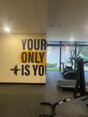 a gym with a sign that says your only is you at Moderno apart en Col Escalón,vista,piscina,gimnasio in San Salvador