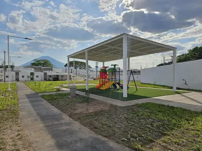 a park with a pavilion with children playing in it at Residence in San Miguel in San Miguel