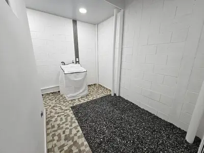 a bathroom with a toilet and a sink in it at Residence in San Miguel in San Miguel