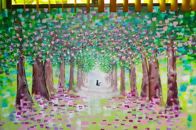 a painting of a forest of trees with a person in the middle at Hotel Oasis in San Salvador