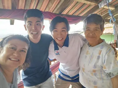 a group of three people posing for a picture at Casa lichis habitación basica in Suchitoto
