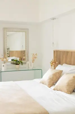 a white bedroom with two beds and a mirror at Modern Apartment 2 Bedrooms 2 Bathrooms WIFI in Las Delicias