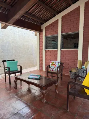 a patio with two chairs and a coffee table at Casa DUNA 3 in Playa San Blas