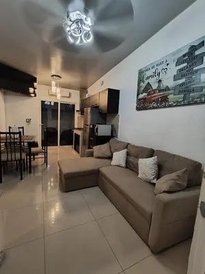 a living room with a couch and a dining room at Luxury Living apartment P1620 in San Miguel