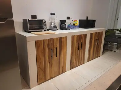a kitchen with a counter with a microwave and a toaster oven at Residence in Salinitas, Los Cobanos in Los Cóbanos