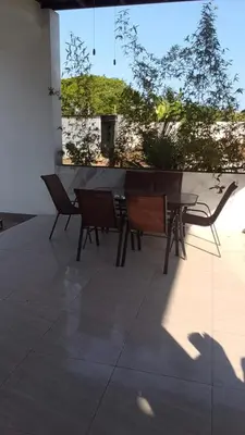 a table and chairs sitting on a patio at Residence in Salinitas, Los Cobanos in Los Cóbanos
