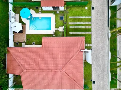 an overhead view of a house with a red roof at Bungalow en La Playa- Amatecampo Villas in La Esmeralda