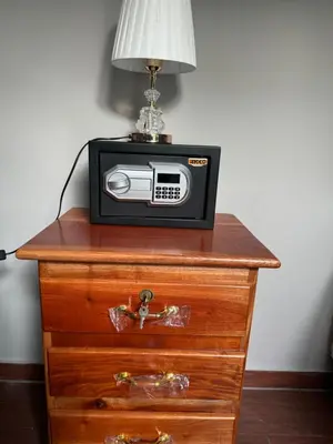 a small radio sitting on top of a dresser at Container house in La Esmeralda