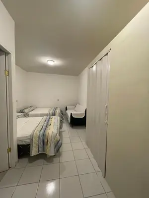 a small room with two beds and a closet at Two Beds San Francisco Chinameca in San Francisco Chinameca