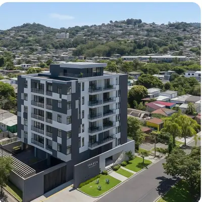 an aerial view of a building in a city at Dormitorio privado con tu propio baño El apartamento la cocina y las áreas comunes son compartidas in San Salvador
