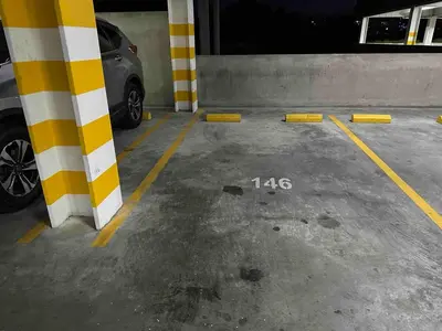 a parking lot with a car parked in a garage at Beautiful apartment near Salvador del Mundo in San Salvador