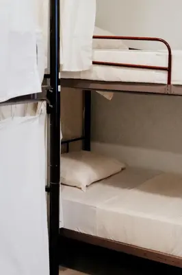 a group of bunk beds in a dorm room at Surfside El Tunco in Tamanique