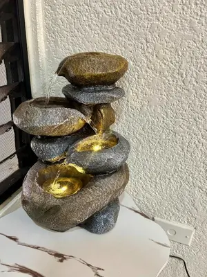 a stack of rocks with a water fountain at Casa Virginia, AC, Close to Downtown, Private in Santa Ana
