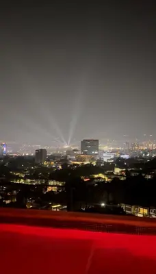 a view of a city at night with lights at Apartment With Pool In Colonia Escalon in San Salvador