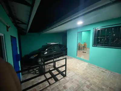 a car parked in a room with a blue wall at Casa Apaneca in Apaneca