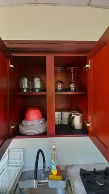 a kitchen with a sink and a counter with dishes at Casa Victoria in San Miguel