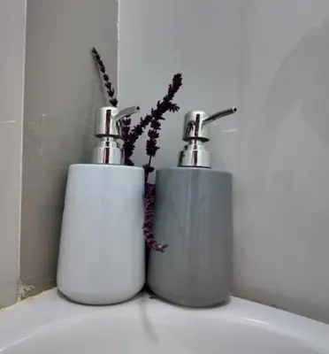 two toilets sitting on top of a bathroom sink at Suite para dos Las Terrazas in San Salvador