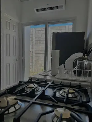 a kitchen with a stove top in a kitchen at Tu lugar tranquilo cerca de todo in San Miguel