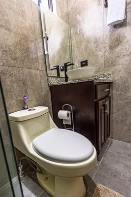 a bathroom with a toilet and a sink at Bungalos Vista a Cayaguanca in San Ignacio