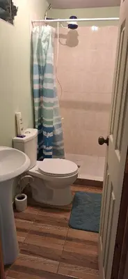 a bathroom with a toilet and a shower at Casa El Trébol