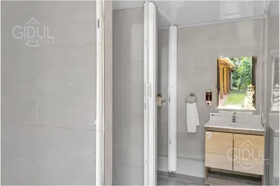 a bathroom with a sink and a mirror at Comfy Bedroom in a hostal at Coatepeque lake in El Congo