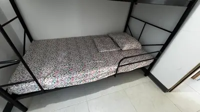 an overhead view of a bed in a room at Vista de la capital in San Salvador
