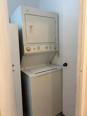 a washer and dryer in a small room at Apartment with an excellent location by Redondel Masferrer San Salvador, El Salvador in San Salvador