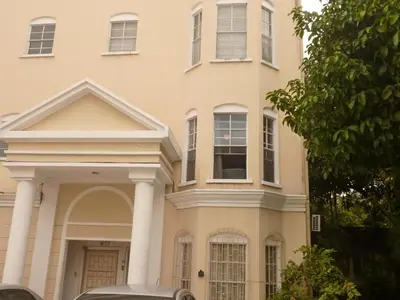 a house with a car parked in front of it at Apartment with an excellent location by Redondel Masferrer San Salvador, El Salvador in San Salvador