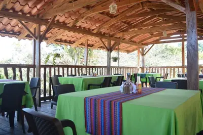 a group of tables and chairs in a pavilion at Gran Bonanza Hotel in Alegría