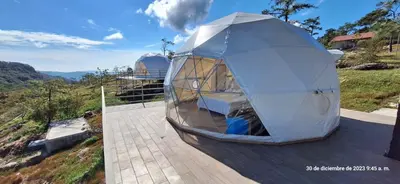 an observatory is sitting on top of a house at Hotel y restaurante villa marquez in Perquín