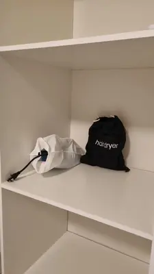 a black bag sitting on top of a shelf at Cozy House! San Miguel in San Miguel