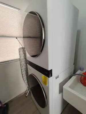 a kitchen with a microwave and a sink at Luxury Cozy Home in San Miguel