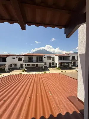 a view of a building with a red roof at Luxury Cozy Home in San Miguel