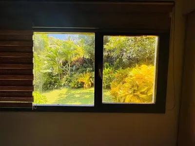 a window in a room with a view of a garden at Essenz Bahía in El Níspero